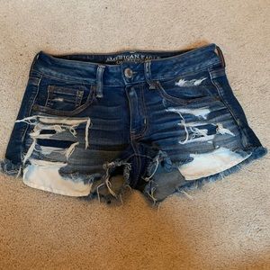 AE RIPPED JEAN SHORTS